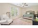 Bright bedroom features a comfortable chair, neutral tones, and a serene ambiance at 75 Hunters Ct, Dallas, GA 30157