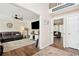 Open-concept living area with hardwood floors, and inviting leather furniture, creating a cozy atmosphere at 75 Hunters Ct, Dallas, GA 30157