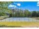 Well-maintained community tennis courts for active living and recreational enjoyment at 75 Hunters Ct, Dallas, GA 30157