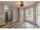 Cozy breakfast nook featuring modern floors and windows for natural light and a laundry area at 123 Chippewa Run, Auburn, GA 30011