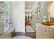 Inviting foyer with stylish decor, wood floors, and a view to the living room at 128 Madison Bnd, Woodstock, GA 30188