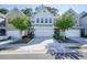 Inviting townhome with a well-maintained front yard and a two-car garage at 128 Madison Bnd, Woodstock, GA 30188