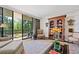Balcony featuring outdoor seating and a view of lush greenery and trees at 2660 Peachtree Rd # 6A, Atlanta, GA 30305