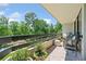 Balcony with comfortable seating and green views at 2660 Peachtree Rd # 6A, Atlanta, GA 30305