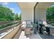 Cozy balcony with comfortable seating area and scenic outdoor views at 2660 Peachtree Rd # 6A, Atlanta, GA 30305