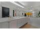 Bathroom featuring double sinks, tiled tub, large mirrors and overhead lighting at 2660 Peachtree Rd # 6A, Atlanta, GA 30305