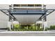 Inviting building entrance with modern architecture and manicured landscaping at 2660 Peachtree Rd # 6A, Atlanta, GA 30305