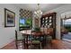 Cozy dining room featuring a round table, seating for six, and a decorative chandelier at 2660 Peachtree Rd # 6A, Atlanta, GA 30305