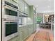 A well-appointed kitchen boasts stainless steel appliances and seamlessly connects to the dining area at 2660 Peachtree Rd # 6A, Atlanta, GA 30305