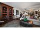 Living room with an ornate cabinet, comfortable seating, and stylish decor at 2660 Peachtree Rd # 6A, Atlanta, GA 30305