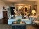 Bright living room with comfortable seating, a round table, and stylish decor at 2660 Peachtree Rd # 6A, Atlanta, GA 30305
