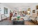 Bright living room with decorative rug, comfortable seating, and ornate decorations at 2660 Peachtree Rd # 6A, Atlanta, GA 30305