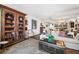 Charming living room with a large cabinet, decorative rug, and elegant seating arrangement at 2660 Peachtree Rd # 6A, Atlanta, GA 30305