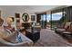 Bright living room featuring comfortable seating, a large window, and stylish decor at 2660 Peachtree Rd # 6A, Atlanta, GA 30305