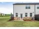 View of backyard featuring a well-maintained lawn and stone patio at 3848 Hester St, Duluth, GA 30097