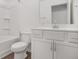 Bright bathroom features a shower-tub combo, white vanity, and modern faucet at 3848 Hester St, Duluth, GA 30097