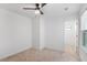 A bedroom with carpeted floors, ceiling fan and multiple windows providing natural light at 3848 Hester St, Duluth, GA 30097