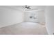 Spacious bedroom with a ceiling fan and a large window, providing ample natural light and ventilation at 3848 Hester St, Duluth, GA 30097