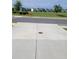 Spacious concrete driveway with a view of the community homes across the street at 3848 Hester St, Duluth, GA 30097