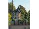 Welcome to Encore: Stone monument at the entrance surrounded by lush landscaping at 3848 Hester St, Duluth, GA 30097