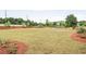 Community greenspace with grass and landscaping at 3848 Hester St, Duluth, GA 30097