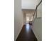 Inviting hallway with hardwood floors and staircase leading to the upper level at 3848 Hester St, Duluth, GA 30097