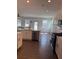 Stylish kitchen featuring stainless appliances, granite countertops, and a large island at 3848 Hester St, Duluth, GA 30097