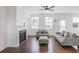 Spacious living room featuring a fireplace, recessed lighting, and a ceiling fan at 3848 Hester St, Duluth, GA 30097