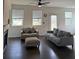 Comfortable living room with lots of windows and a fireplace at 3848 Hester St, Duluth, GA 30097