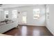 Bright living room with lots of natural light from the large windows at 3848 Hester St, Duluth, GA 30097