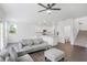 Bright, open-concept living space with kitchen, living, and dining areas at 3848 Hester St, Duluth, GA 30097