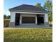 Attractive community mail kiosk facility with multiple boxes, set in grassy area at 3848 Hester St, Duluth, GA 30097