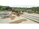 Community pool area with lounge chairs, tables, and umbrellas at 3848 Hester St, Duluth, GA 30097