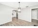 Inviting dining area showcasing a modern chandelier and an open floorplan at 4289 Post Rd, Winston, GA 30187