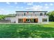 Expansive backyard featuring an outdoor patio and a well-maintained lawn at 5370 Greenleaf Sw Dr, Mableton, GA 30126
