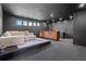 Finished basement with modern wet bar, media area, and recessed lighting at 5370 Greenleaf Sw Dr, Mableton, GA 30126