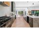 Spacious kitchen with marble countertops, custom cabinets, and stainless steel appliances at 5370 Greenleaf Sw Dr, Mableton, GA 30126