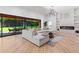 Spacious living area with a fireplace, and expansive sliding glass doors to a patio, providing seamless indoor-outdoor living at 5370 Greenleaf Sw Dr, Mableton, GA 30126