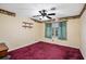 Bedroom with red carpet and a window at 5491 Valley Brook Road Southeast Se Rd, Mableton, GA 30126