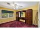 Bedroom featuring a large built-in vanity with ample storage and a ceiling fan at 5491 Valley Brook Road Southeast Se Rd, Mableton, GA 30126
