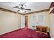Bedroom with red carpet and built in shelves at 5491 Valley Brook Road Southeast Se Rd, Mableton, GA 30126