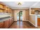 A dining room with a window to a pool and hardwood floors at 5491 Valley Brook Road Southeast Se Rd, Mableton, GA 30126