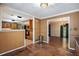 Open dining room with hardwood floors leading to a kitchen and dining area at 5491 Valley Brook Road Southeast Se Rd, Mableton, GA 30126