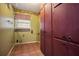 Laundry room with tile floors, vintage cabinets and utility connections at 5491 Valley Brook Road Southeast Se Rd, Mableton, GA 30126