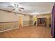 Open living area with ceramic tile flooring, neutral walls and a ceiling fan at 5491 Valley Brook Road Southeast Se Rd, Mableton, GA 30126