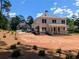 The backyard features an outside kitchen and a cozy screened porch perfect for entertaining at 8239 High Lake Ter, Covington, GA 30014