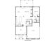 Layout of 1st floor plan with flex spaces, garage entry, bedroom, kitchen, dining, and Gathering room at 8239 High Lake Ter, Covington, GA 30014