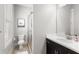 Bathroom features a vanity sink, framed shower, and neutral walls, offering a blend of style and functionality at 914 Martin Nw St, Atlanta, GA 30315