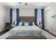 Comfortable main bedroom with neutral walls, a cushioned bedframe, and natural light creating a relaxing space at 914 Martin Nw St, Atlanta, GA 30315