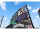 View of Howell Mill district commercial building with a billboard and business signage at 914 Martin Nw St, Atlanta, GA 30315